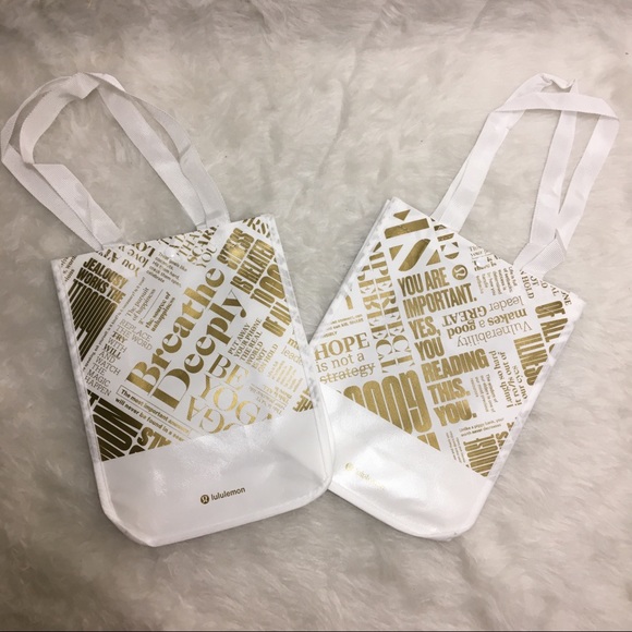lululemon athletica Handbags - 2 Reusable White Gold Lululemon Bags